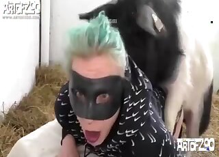 Green-haired chick is enjoying bestiality XXX so much